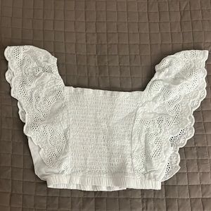 White embroidered pattern crop top